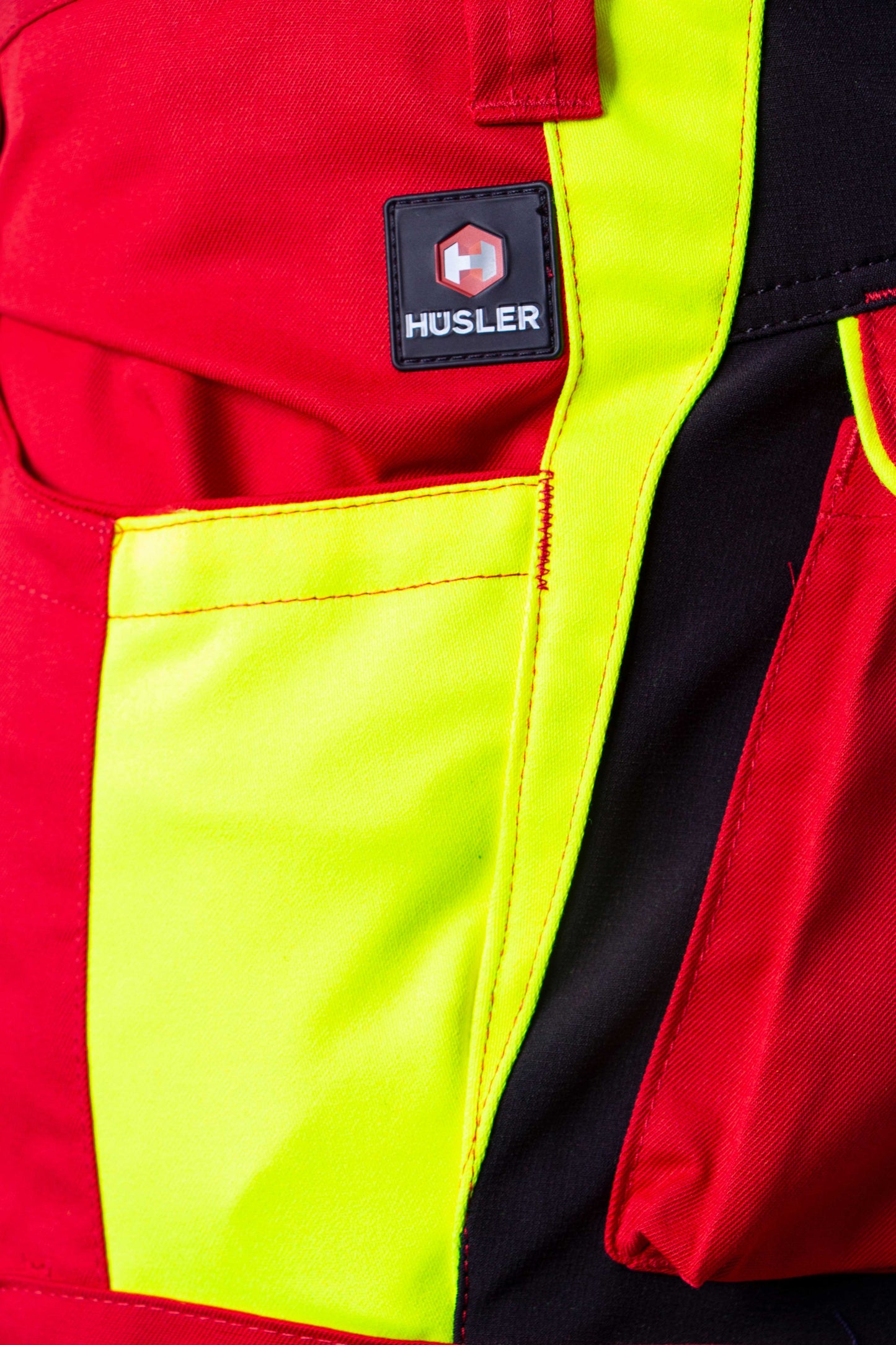 Hüsler Einsatzhose Rettungsdienst, rot/leuchtgelb/schwarz, Membrane im Knie
